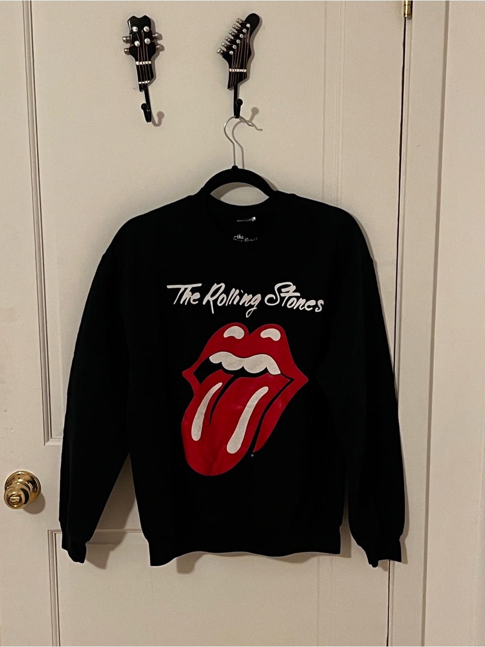 The Rolling Stones Black Crewneck with Iconic Red Tongue Graphic